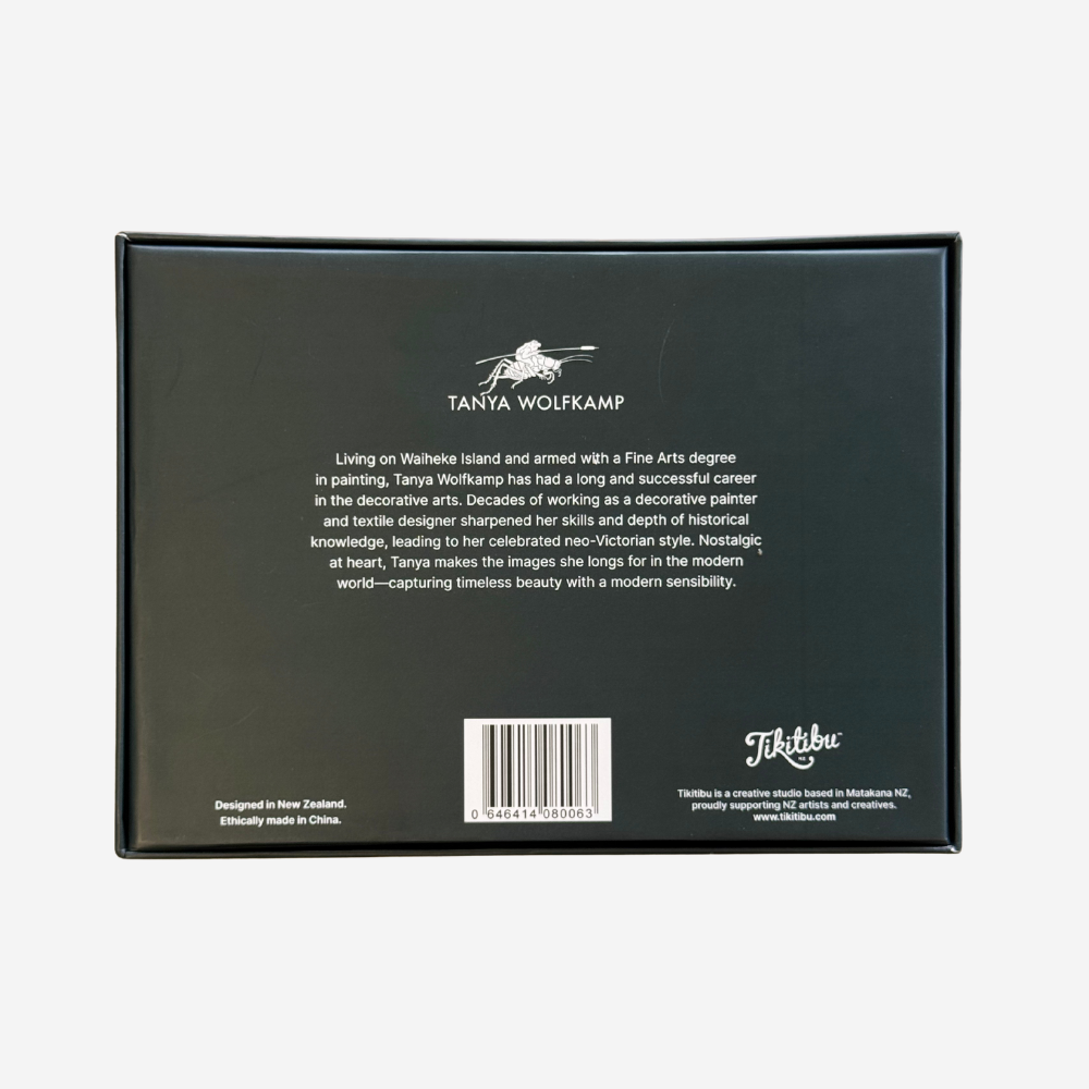 Back of a black box with Tanya Wolfkamp branding and text.