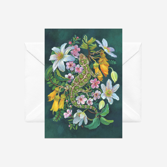 Greeting card with a jeweled gecko and NZ native flowers by Tanya Wolfkamp. It comes with a white envelope.