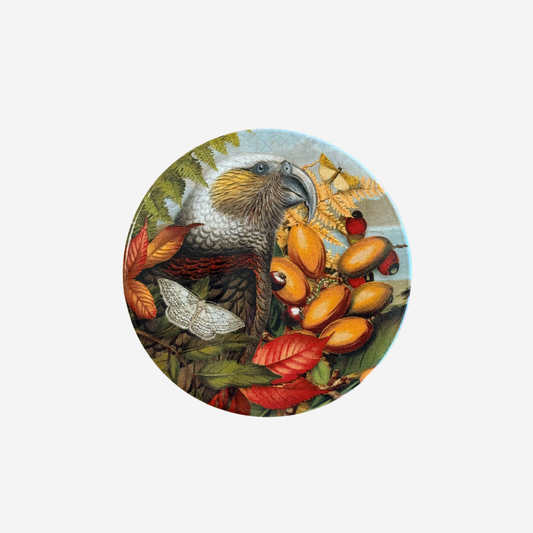 Ceramic coaster of kaka and karaka berries by Tanya Wolfkamp