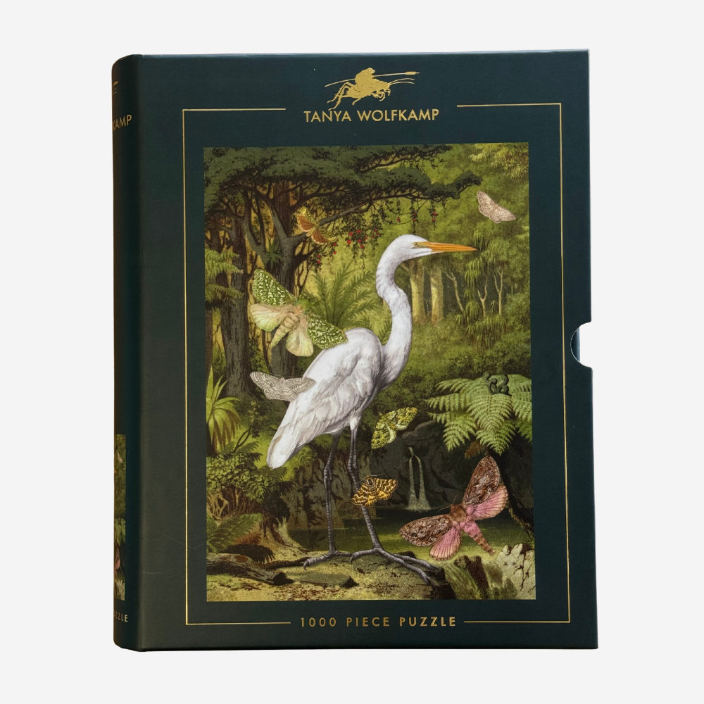 1000 piece puzzle of vintage NZ heron and moths in forest scene by Tanya Wolfkamp