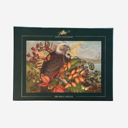 NZ vintage jigsaw puzzle in autumn tones of a kaka and karaka berries by Tanya Wolfkamp 