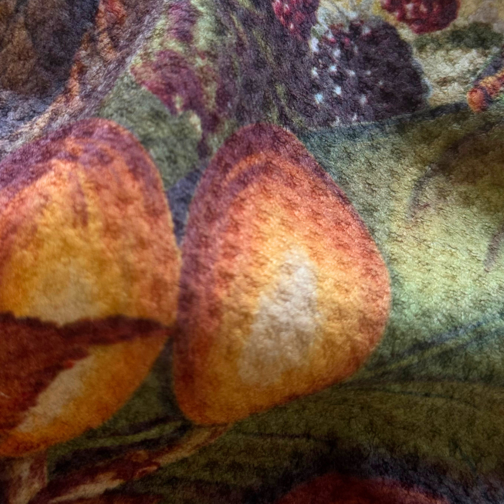 Close-up of a textured fabric with orange and brown colors