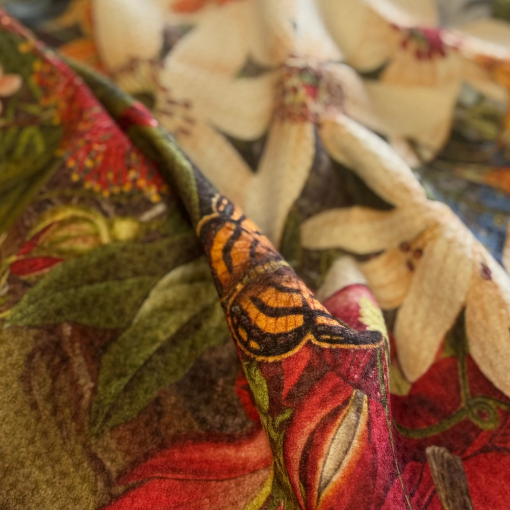 Close-up of a colorful fabric with intricate patterns and textures.
