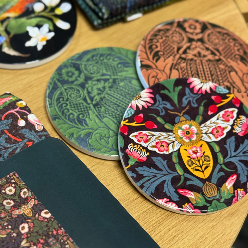 Colorful patterned coasters on a wooden surface